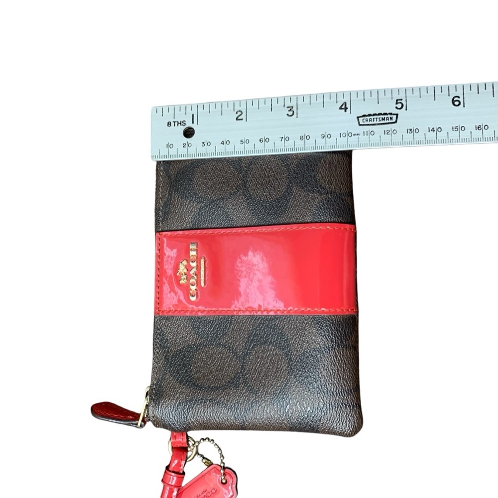 Coach corner zip wristlet wallet‎ in Signature PVC brown leather/red patent. EUC - Picture 8 of 8
